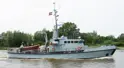 Navy vessel MHV 904 at sea near land