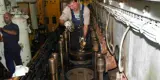 A man overhauling a ship engine